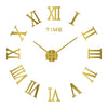 A round gold-toned clock face with Roman numerals and a long golden hand pointing towards the right.