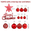 A set of 102 Christmas ornaments featuring a tree top star and letters in various red finishes.