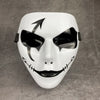 A white masquerade mask with black markings and an ancient style design.
