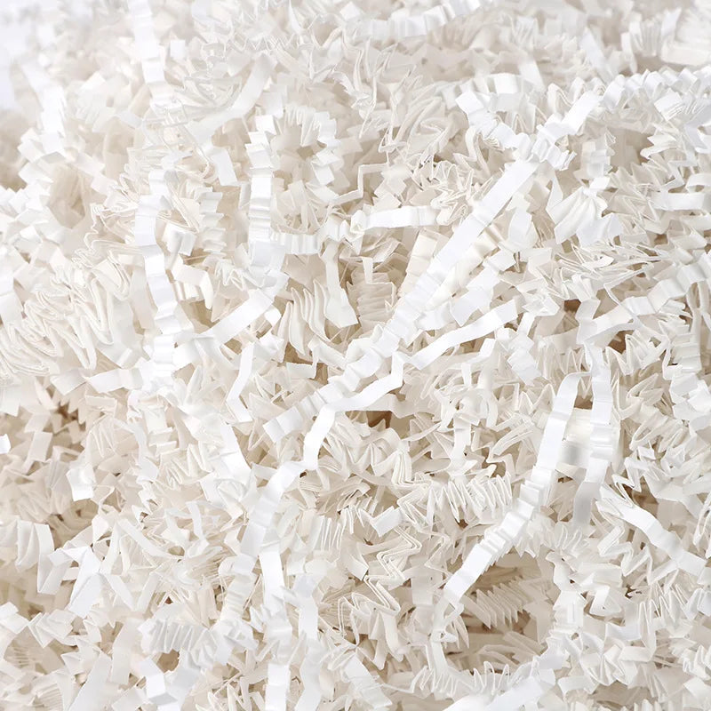 White crinkle paper shred filler for Halloween treat bags and décor