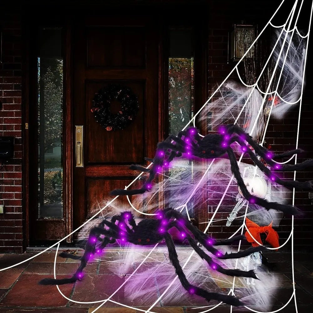 A black LED light-up furry Halloween spider decoration with a purple glow is displayed in front of a dark wooden door.
