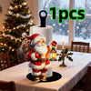 A festive Santa Claus kitchen paper towel holder with a beard and red suit is displayed on a white table.