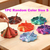 A hand holds a 1PC random color size S 3D-printed star fidget spinner with handle, showing various colored geometric shapes.