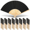 A display of elegant black and gold paper hand fans with wooden sticks and gift bags.