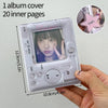 A clear plastic album cover with a pink star sticker and 20 inner pages is shown being held by a hand.