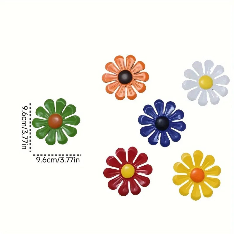 A collection of nine colorful iron sunflower wall art decor pieces in various shades of orange, yellow, red, and blue.