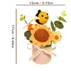 Handmade crochet sunflower bouquet with a bee, presented in a pink gift box.