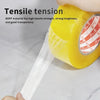 A hand is applying clear, tensile packing tape to a yellow object for sealing.