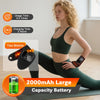 A woman is using a black rechargeable heated wrist massager with vibration therapy on her arm.