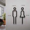 Panneaux de porte silhouette noire pour toilettes, montrant des figures masculines et féminines.