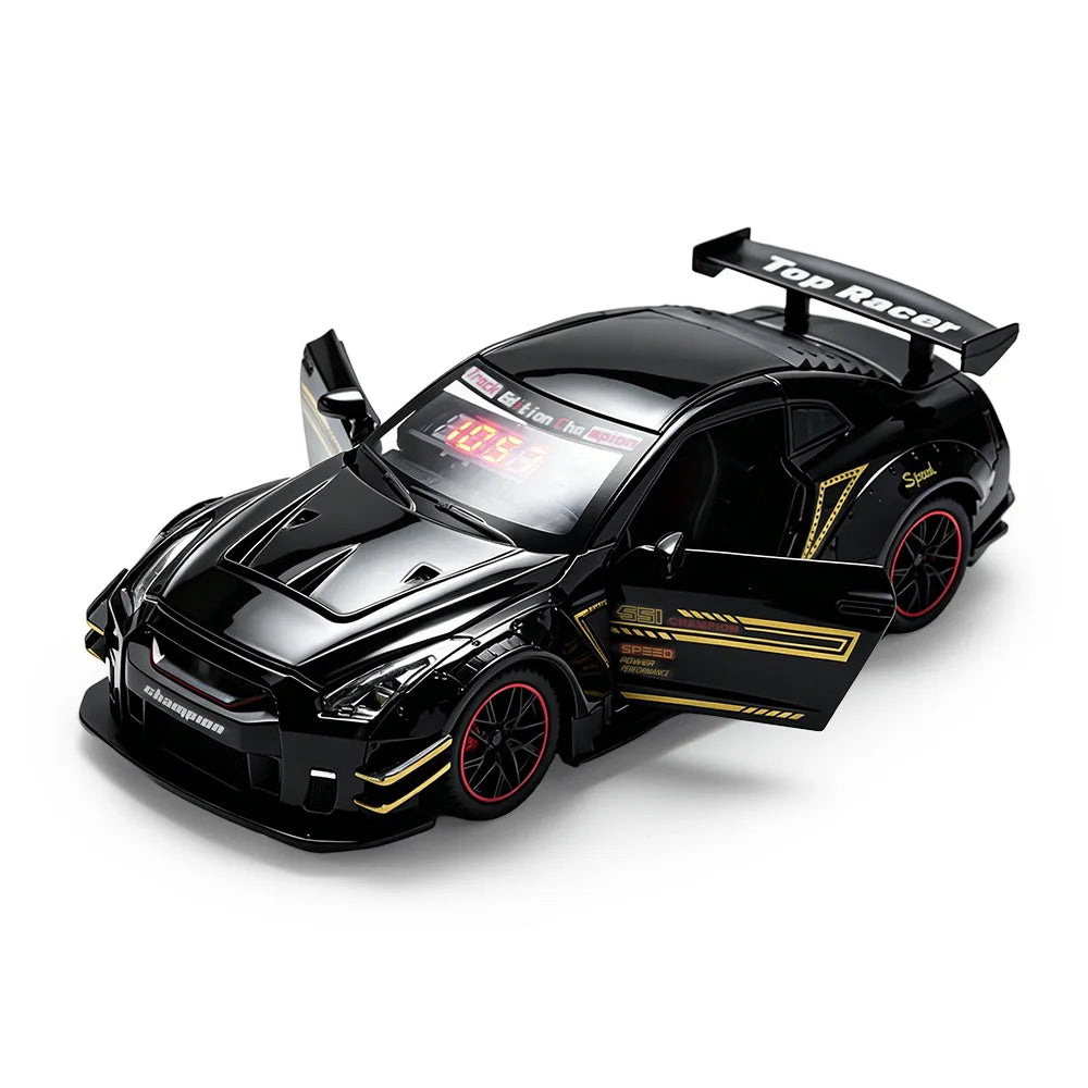 A black sports car model with a spoiler and racing decals is shown in a studio setting.