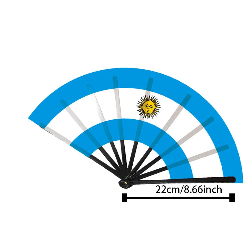 A blue and white folding cheering fan featuring a sun design, used for South America flags.