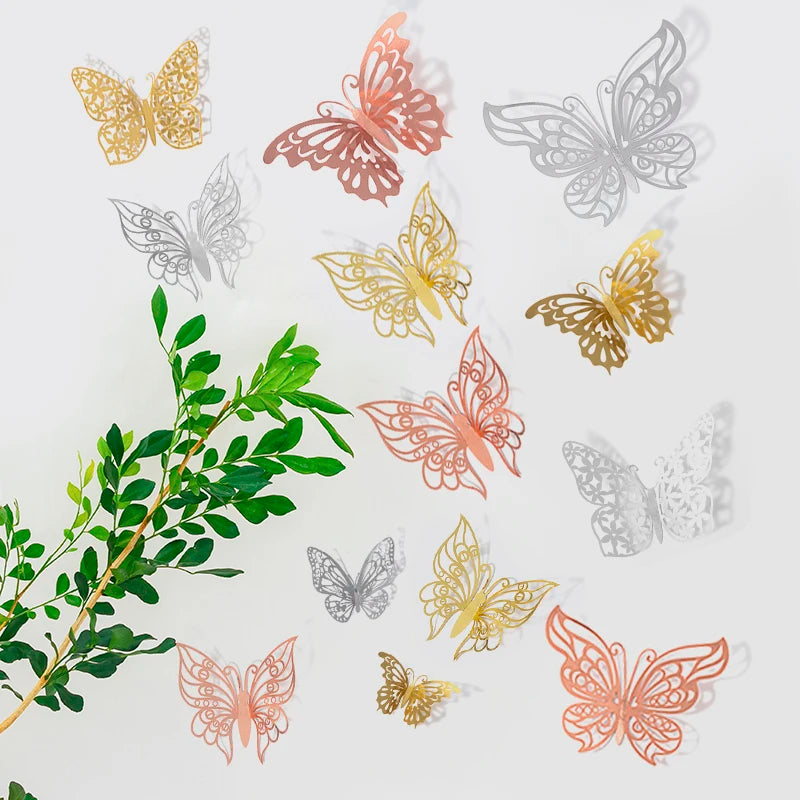A collection of decorative 3D butterfly wall stickers in various shades of gold, pink, and silver on a white background.