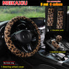 A set of five leopard print car accessories including a steering wheel cover, two shoulder pads, and two handbrake gear cover
