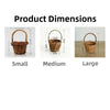 Three handwoven rattan storage baskets of small, medium, and large sizes displayed side by side.