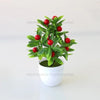Artificial lemon tree bonsai with bright green leaves and red berries planted in a white pot