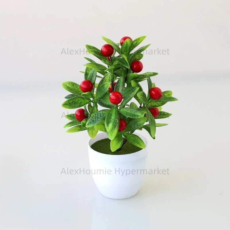 Artificial lemon tree bonsai with bright green leaves and red berries planted in a white pot