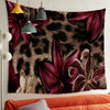 A dark leopard print tapestry wall hanging featuring deep purple and maroon floral patterns.