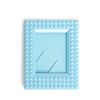 Light blue mini film frame with a diamond pattern border and a square opening