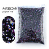 Bag of purplish red glitter resin rhinestones for crafting