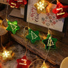 Festive LED fairy lights shaped like stars and trees in green and red for holiday decor