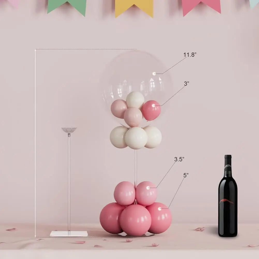 A clear acrylic balloon stand kit with four pink and white balloons displayed against a light pink background.