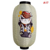 A Japanese paper hanging lantern with a white cylindrical shape decorated with a tiger face and white fur.