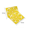Yellow disposable cocktail napkins shaped like lemons with a citrus pattern