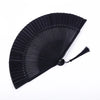 A black traditional Chinese folding fan with a pleated design.