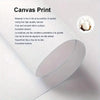 A roll of canvas print material with text describing the quality and texture of the material.