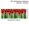 Festive Christmas valence made of polyester featuring a red background with green pine trees and gold accents.