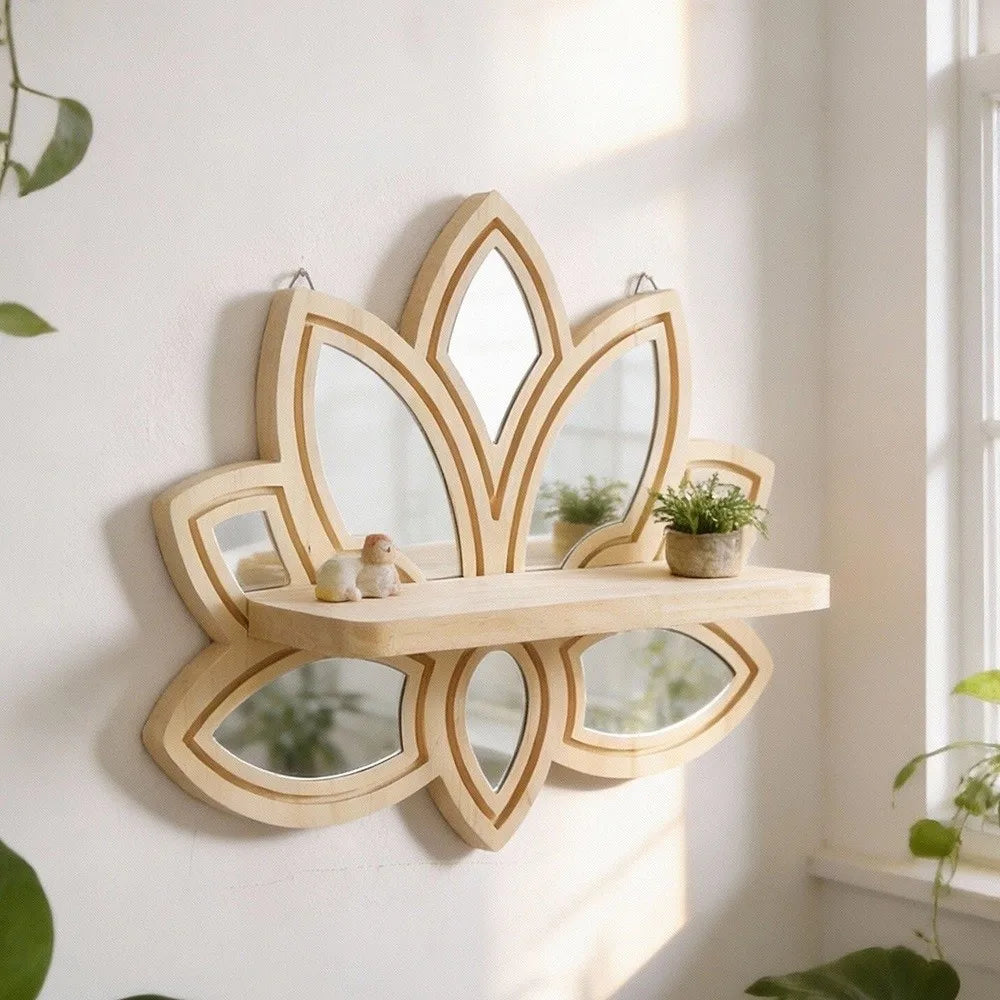 A decorative wooden lotus floating shelf with multiple mirrored cutouts mounted on a white wall.