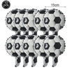 A set of ten black and white standing soccer balloons for party decoration.