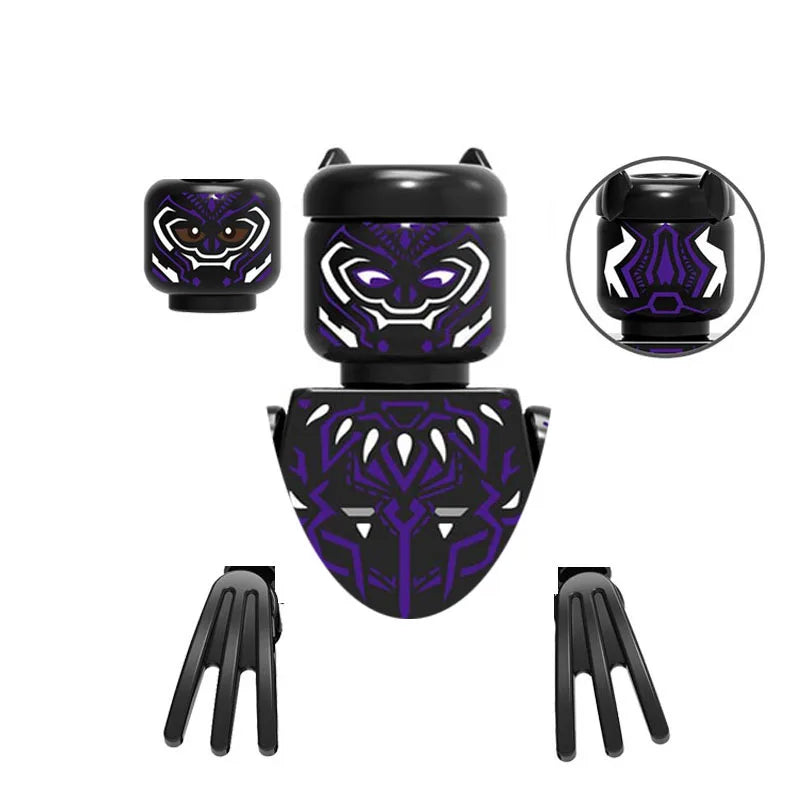 A set of black and purple horror movie icon building blocks featuring stylized monster heads.