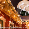 Close-up of translucent string lights draped along a wooden structure for outdoor lighting.