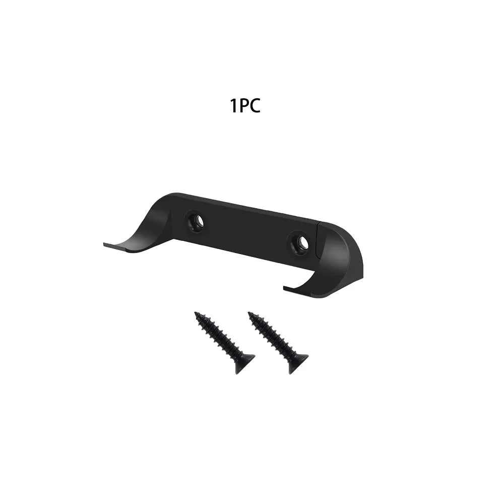 A black wall mount display holder for die-cast car models with two mounting screws.