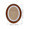 An elegant oval wooden wall photo frame with a brown finish and white border.