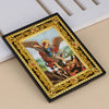 A framed Catholic icon depicting the Holy Family and Archangel St. Michael in gold and black ornate frame