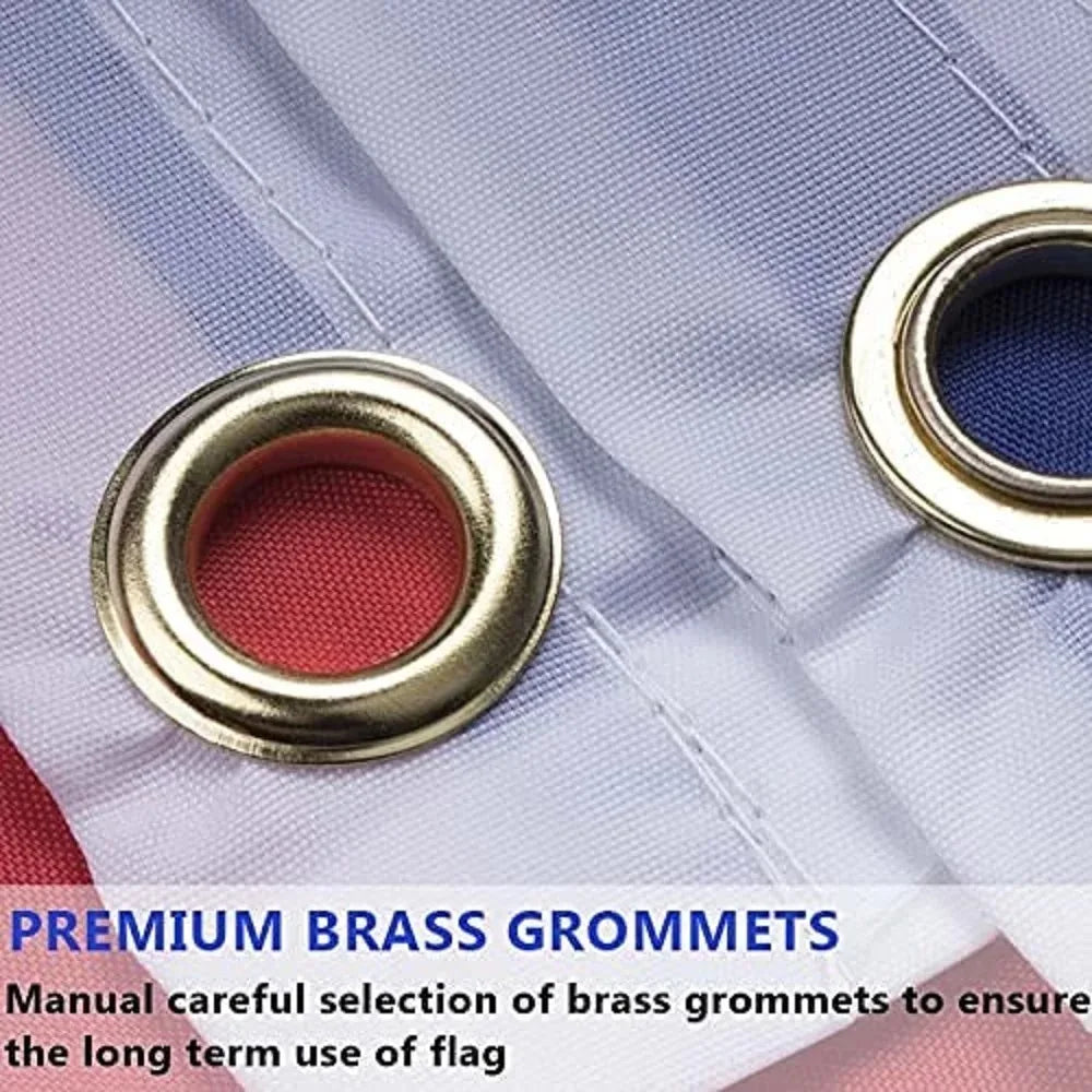 Premium brass grommets on a white flag fabric, showing the metal rings and stitching.