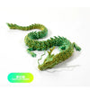 A detailed resin figurine of a green dragon head with scales, used as an ornament or decor.