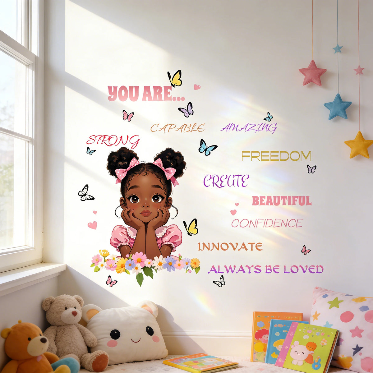 A wall sticker set featuring butterflies and motivational words like strong, capable, amazing, freedom, create, beautiful, co