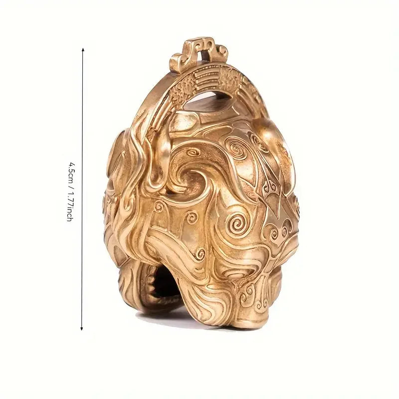 A decorative pure copper lucky tiger head bell for Feng Shui decor featuring intricate swirling patterns.