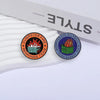 An enamel pin featuring a dumpster and flames, representing the Dumpster Fire Response Team Leader.