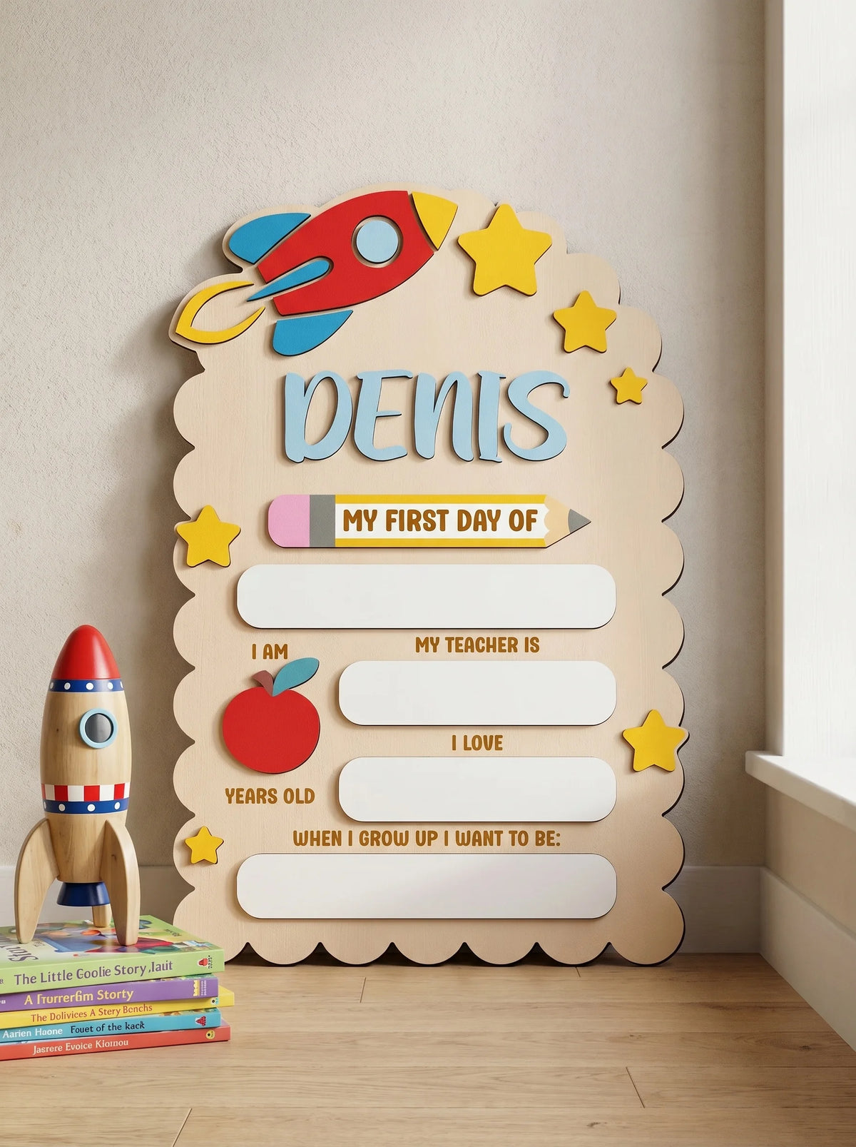 A wooden sign for a child named Denis featuring an airplane, stars, and text about his first day of school.