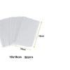 A stack of 50 clear cellophane treat bags measuring 10cm by 18cm with wire ties.