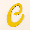 A bright yellow 3D acrylic letter C wall sticker with a black outline.