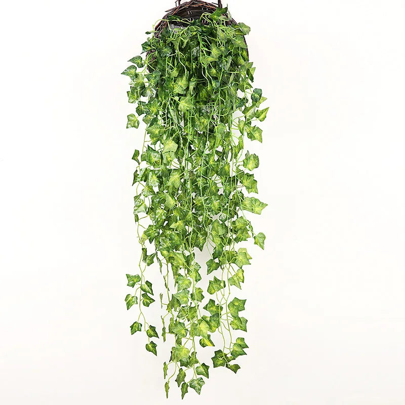 A hanging arrangement of artificial green plant vines cascading down.
