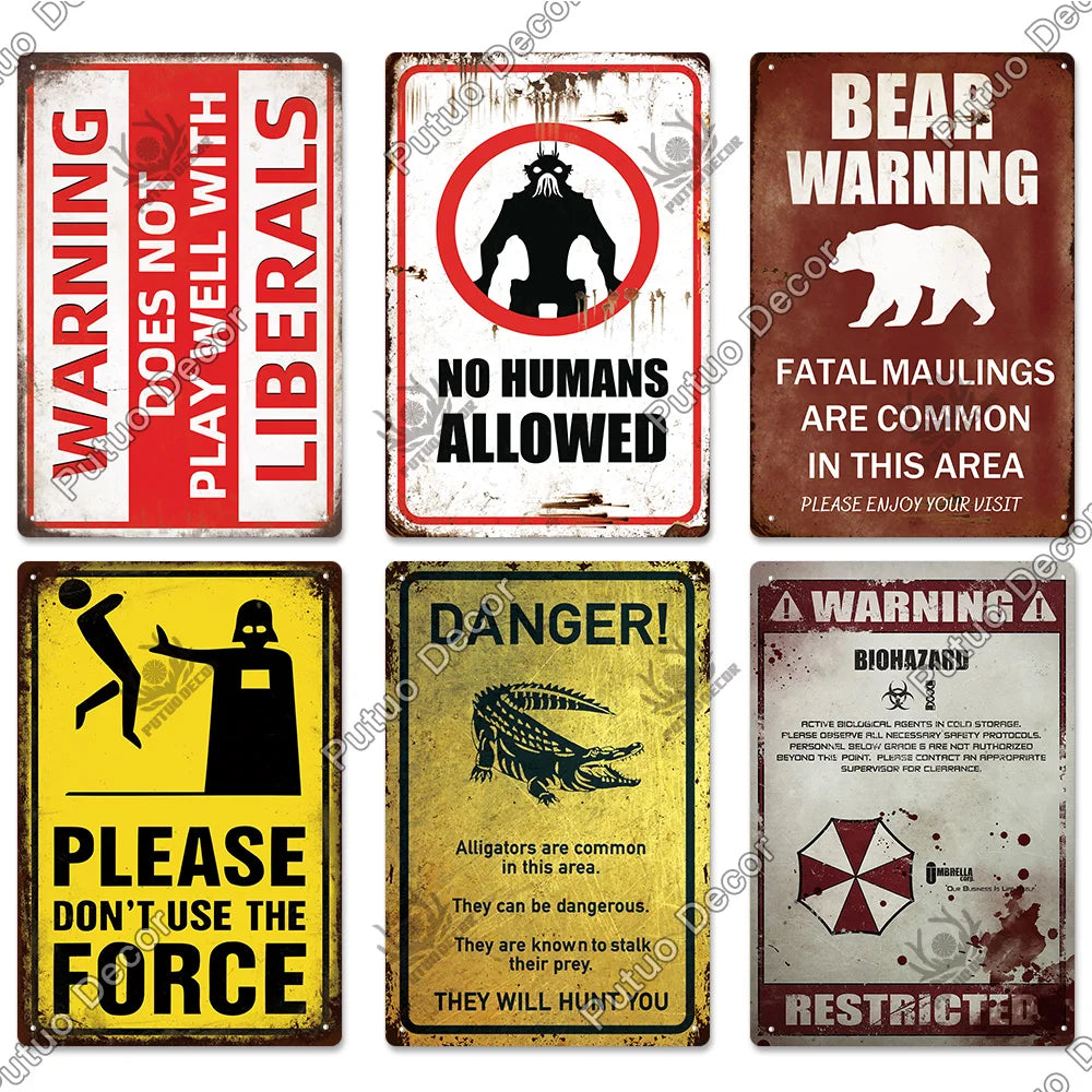A collection of vintage warning metal signs featuring themes like liberals, no humans allowed, and danger warnings.