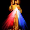 A painting of Divine Mercy Jesus with rays of light emanating from his hands against a dark background.