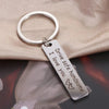 Silver stainless steel keychain with an engraved tag that reads I drive safe handsome I love you